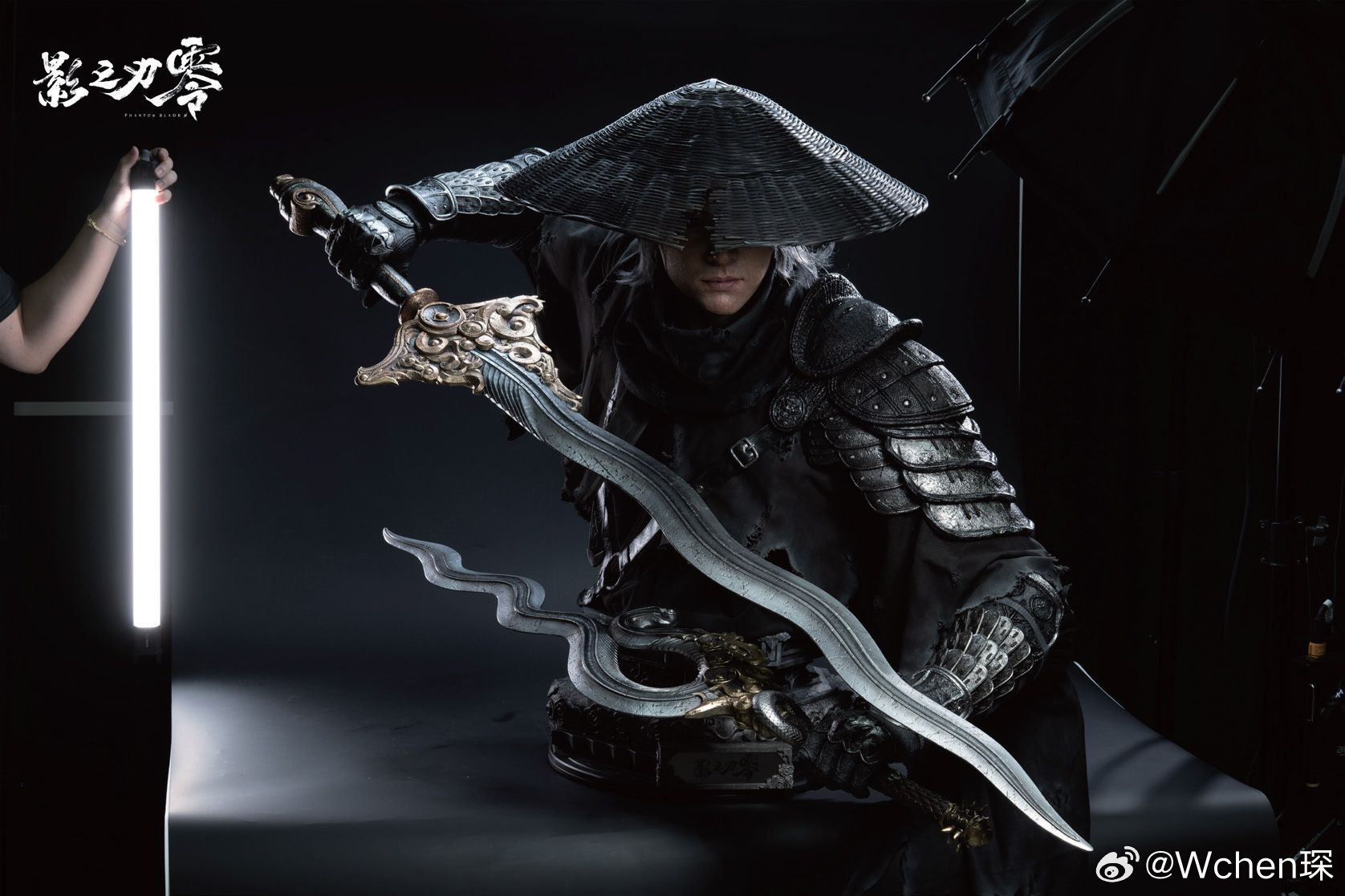 The Soul statue shown at WF2026, wearing the conical hat and holding dual swords